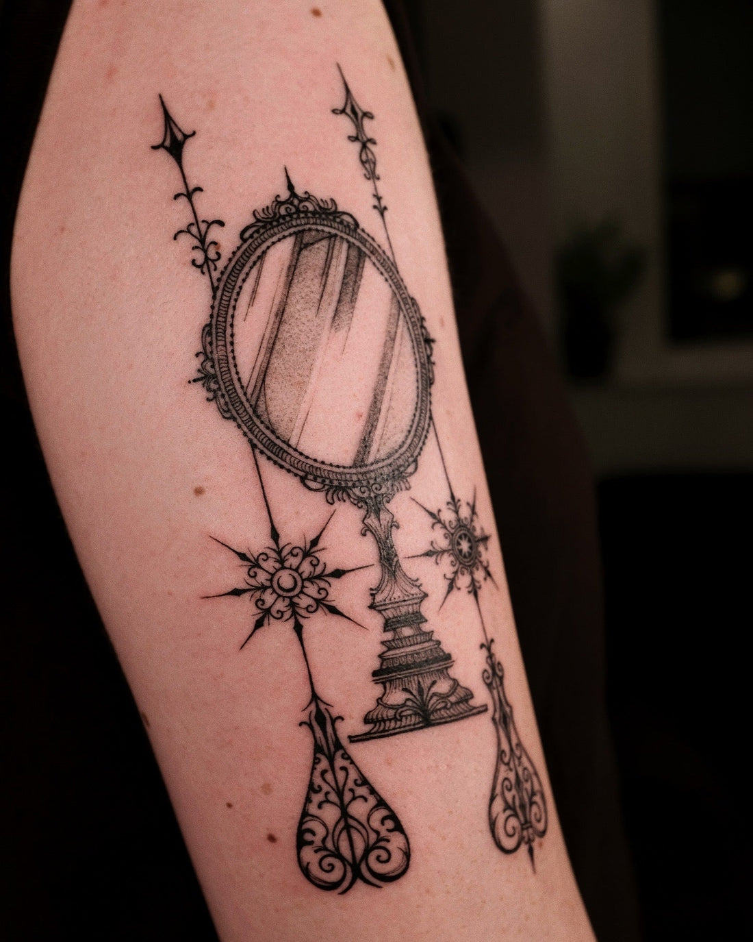 A-006 : Mirror with Sun and Moon ornament